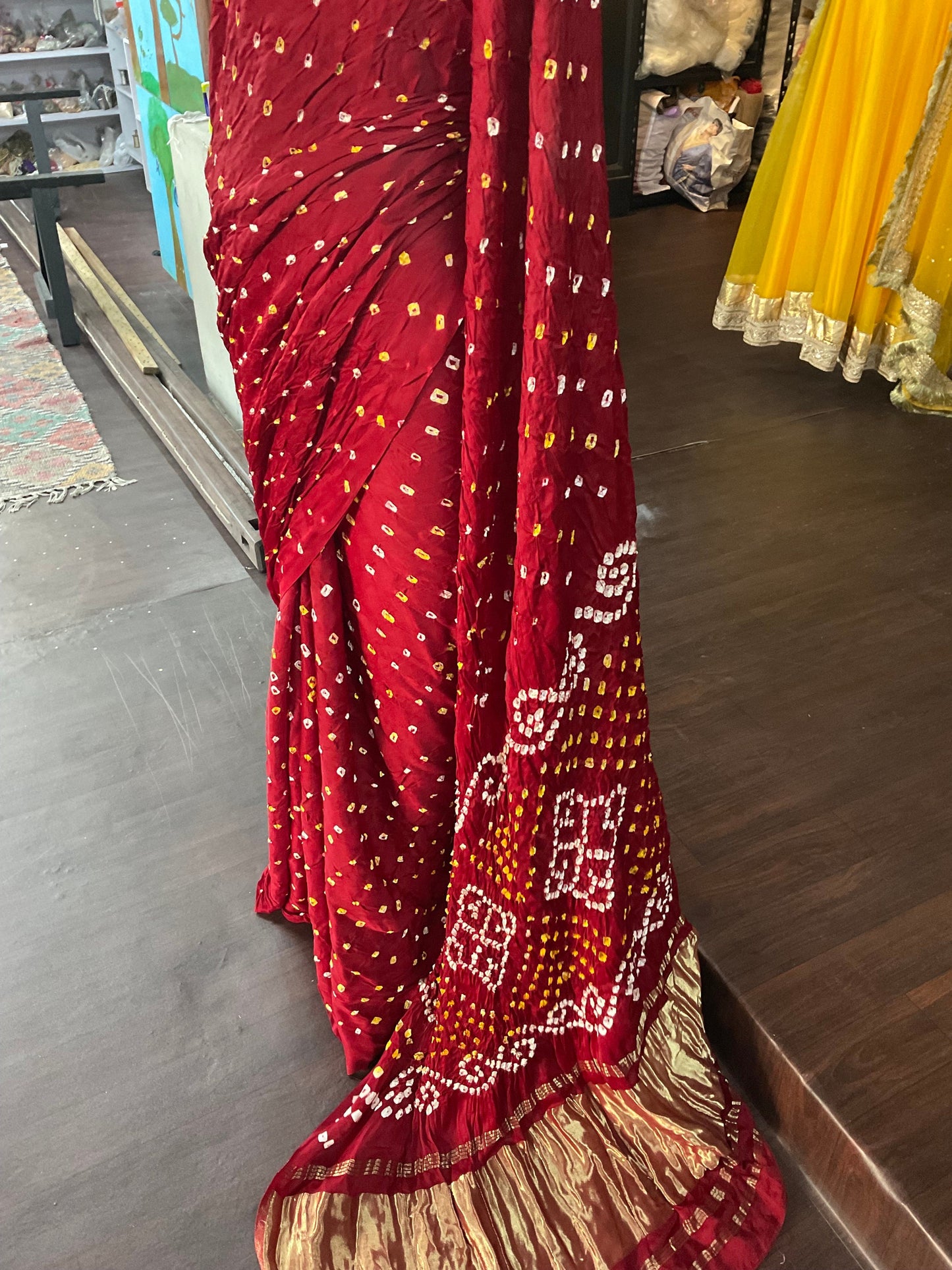 Authentic hand done bandhani on blood red gaji silk with zari border with ready made blouse