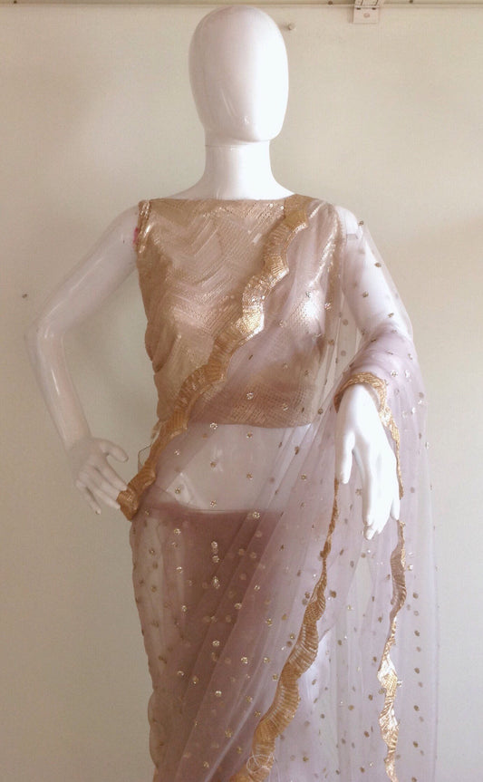 Enchanting Silver Sequin Net Saree with Gold Embroidered Blouse