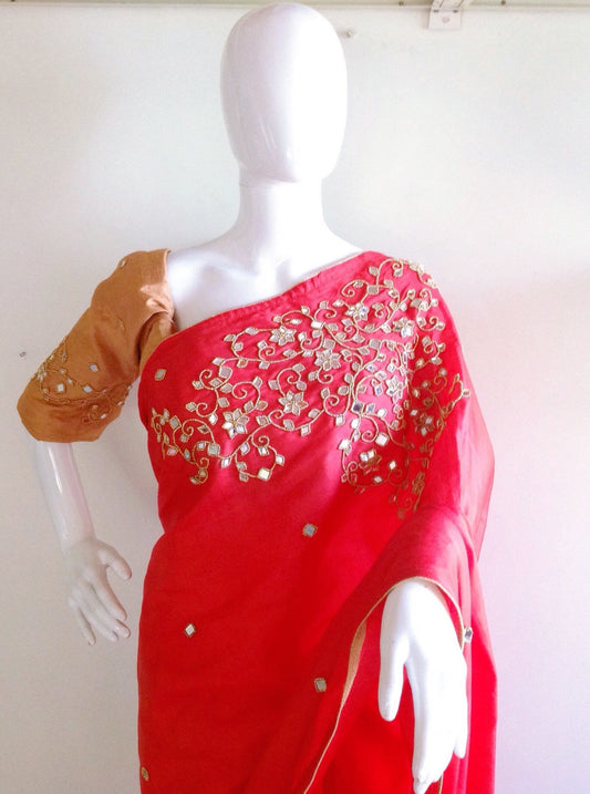 Chilli red semi silk saree with beautiful beads and mirror embroidery with dark gold raw silk blouse with matching embroidery