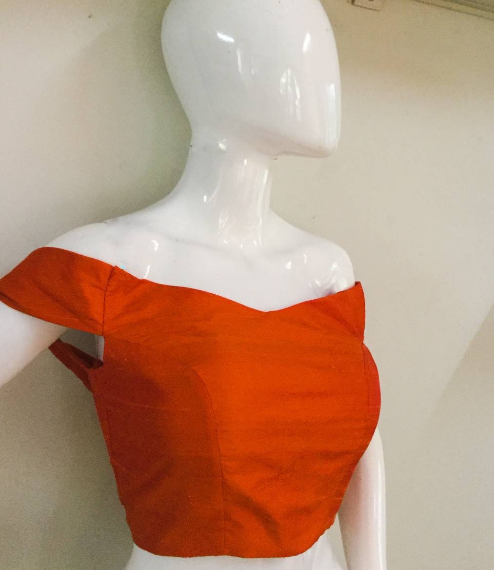 Orange off shoulder raw silk blouse availabl