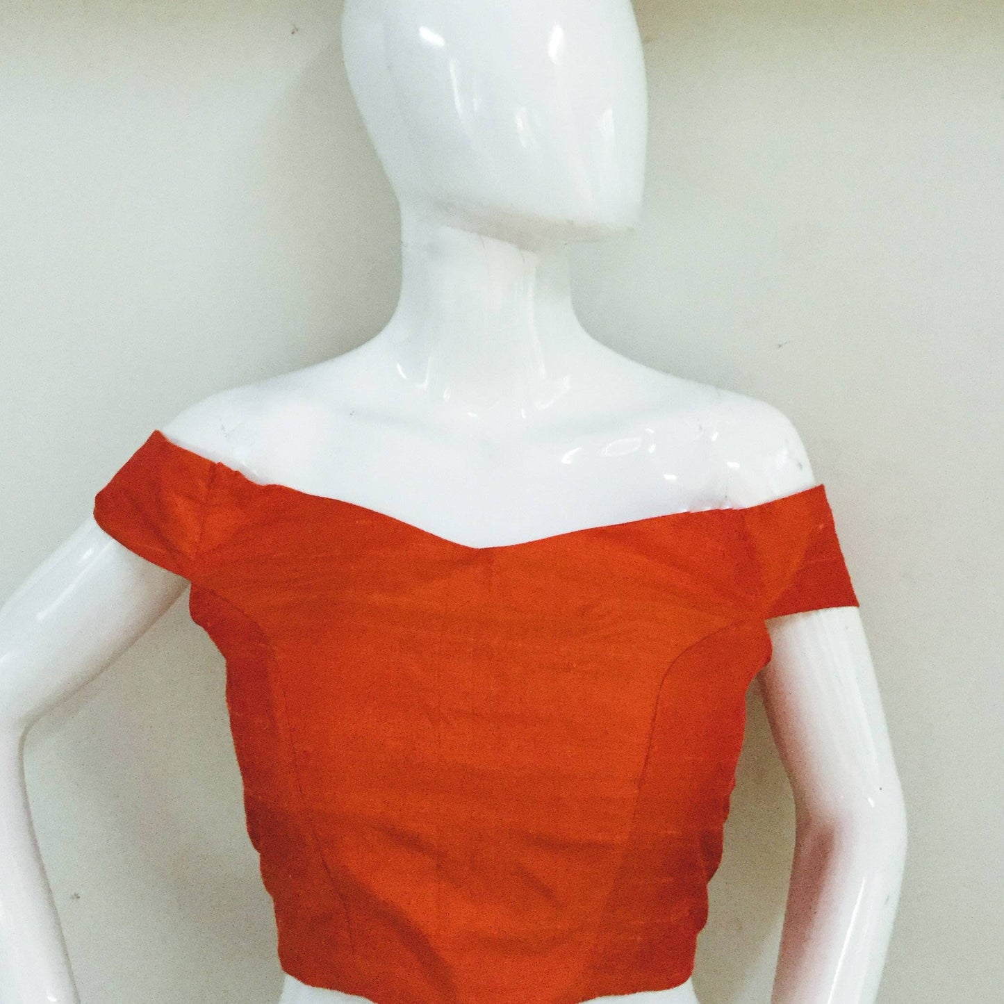Orange off shoulder raw silk blouse availabl