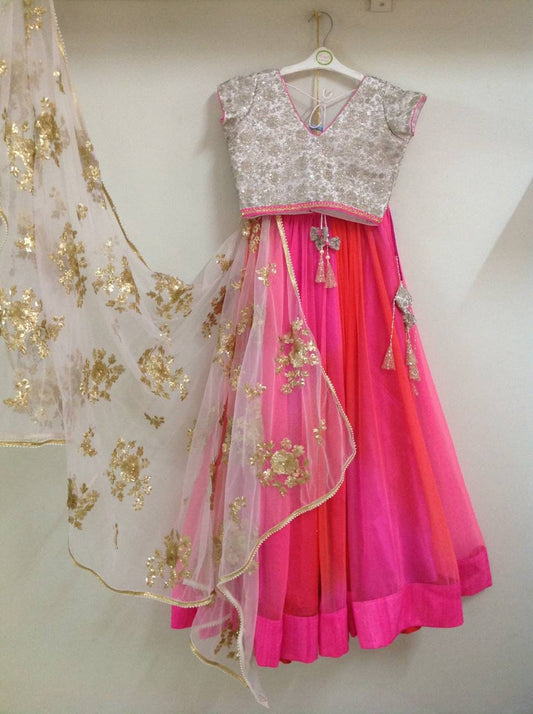 Multicolor orange and pink net lehenga with ivory embroidery top and sequin embroidered dupatta