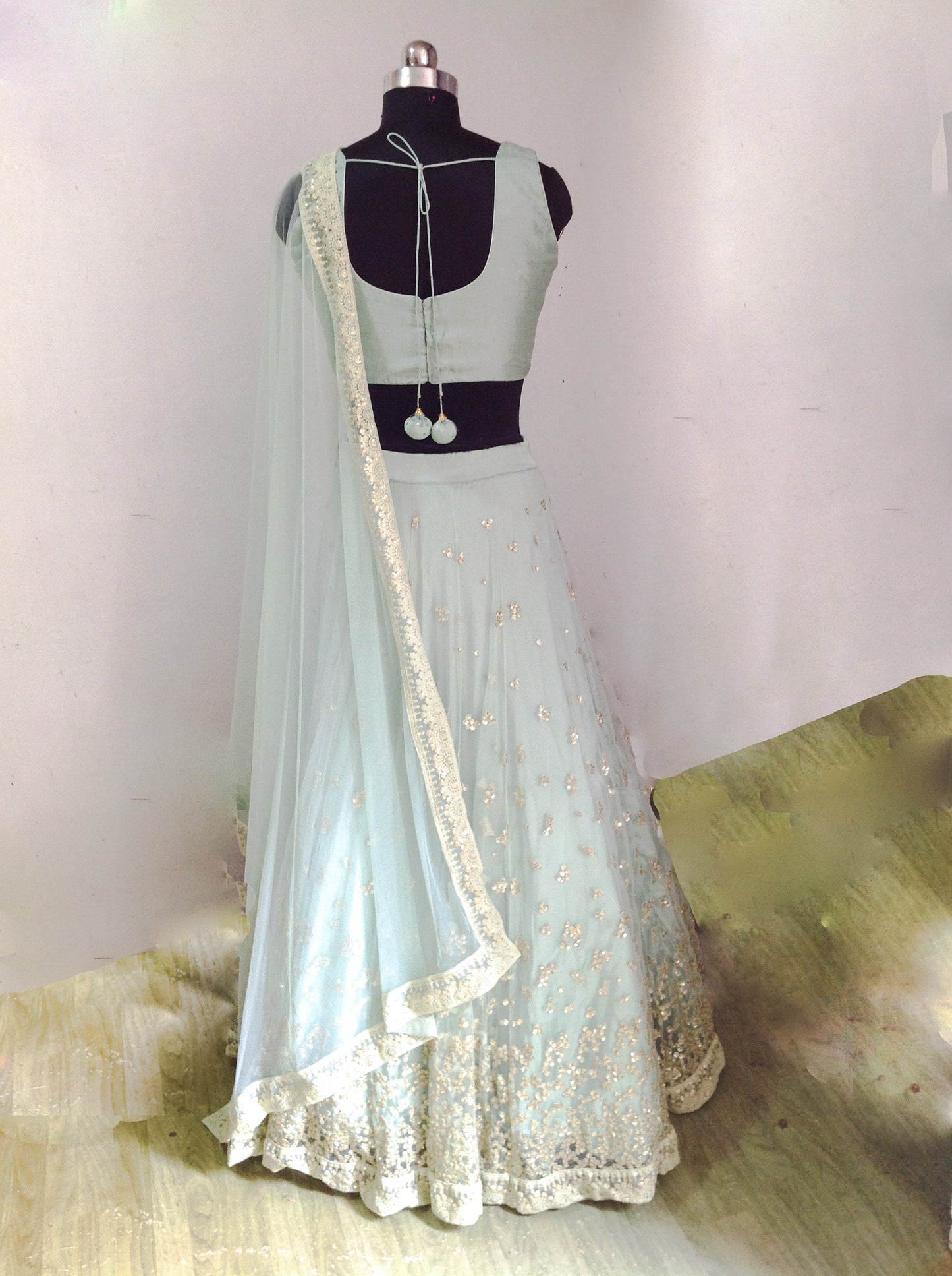 Sage green silk and sequin embroidered lehenga
