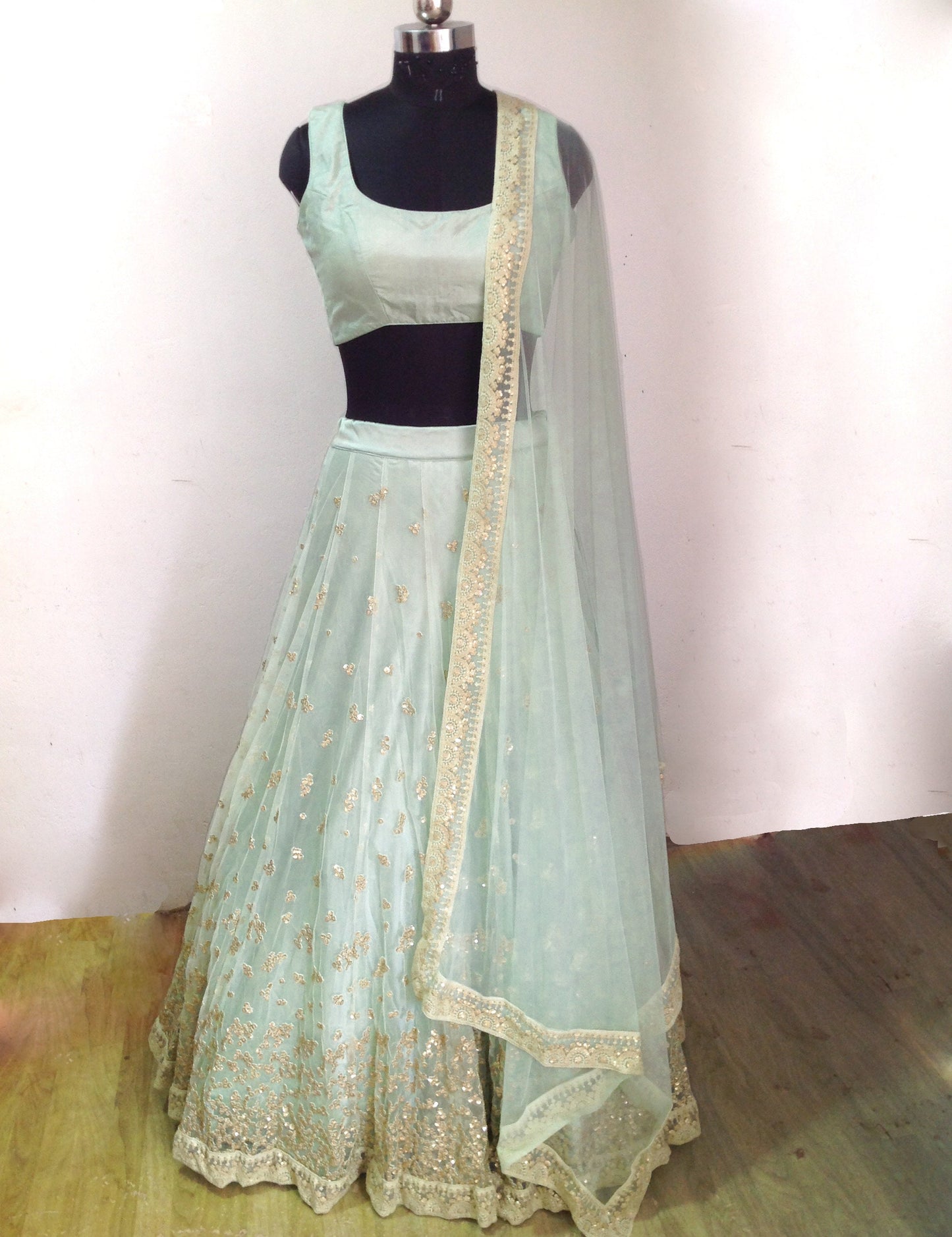 Sage green silk and sequin embroidered lehenga