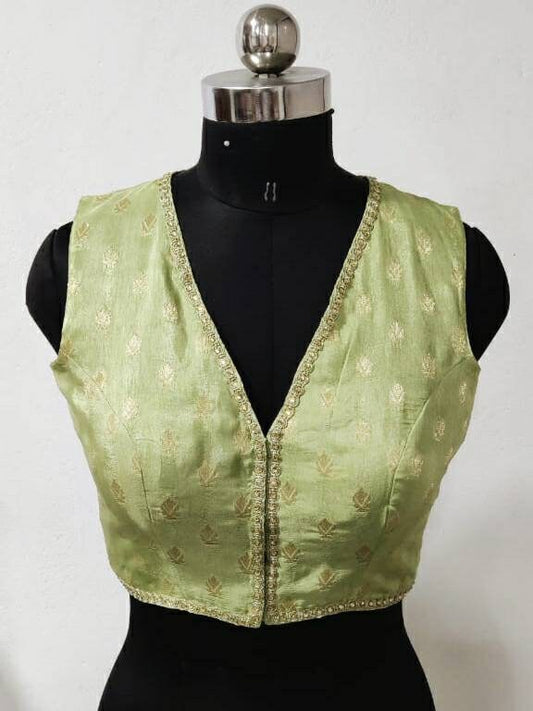 Pista green silk brocade sleeveless V neck blouse