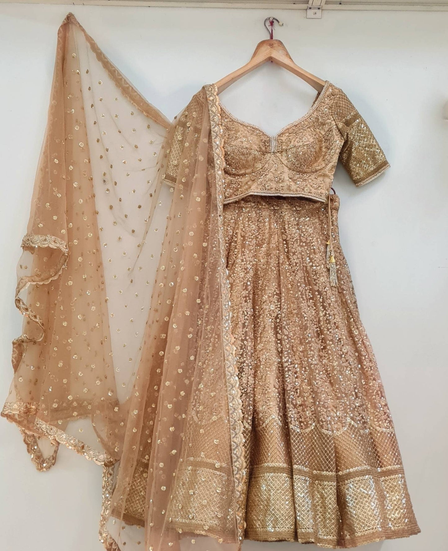 Gold sequinand threadwork lehenga in custom sizes