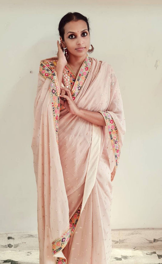 Beautiful multicolor sequin and thread embroidery blouse with blush pink sequin georgette saree