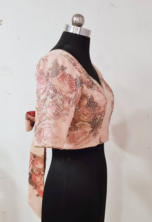 Floral blouse with hand embroidered sequins on net overlay