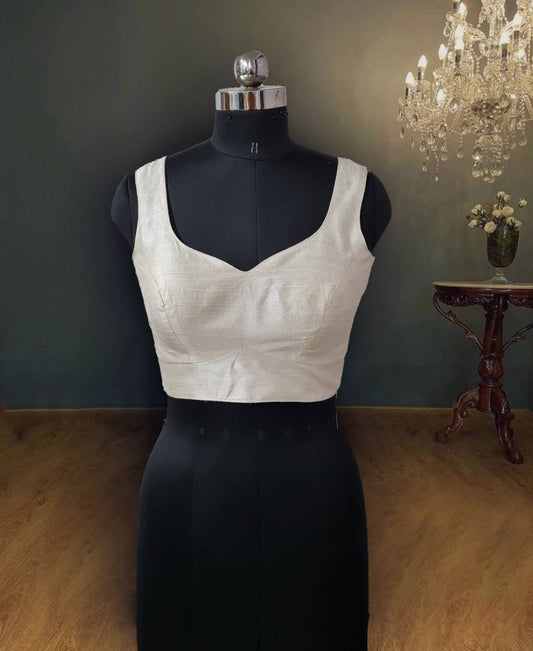 Ivory U neck sleeveless rawsilk blouse