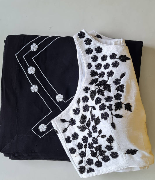 Black Georgette Saree with White Hand Embroidery & Raw Silk Halter Blouse