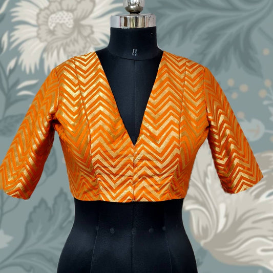 Orange deep V neck chevron geometric brocade blouse with high back neck