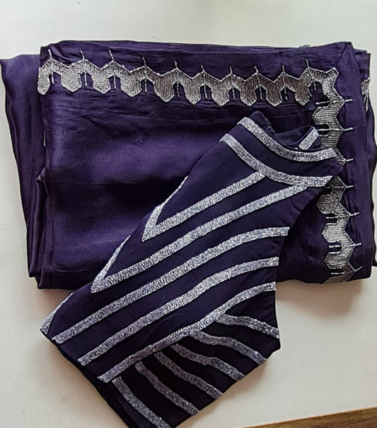 Indigo blue satin georgette saree with matching rawsilk blouse with cutbead embroidery