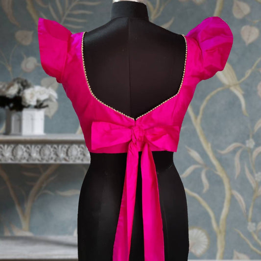 Hot pink magenta silk flutter sleeve blouse with beaded neck and back bow