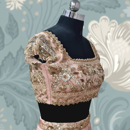 Blush pink net blouse with hand embroidered sequin floral and geometric design