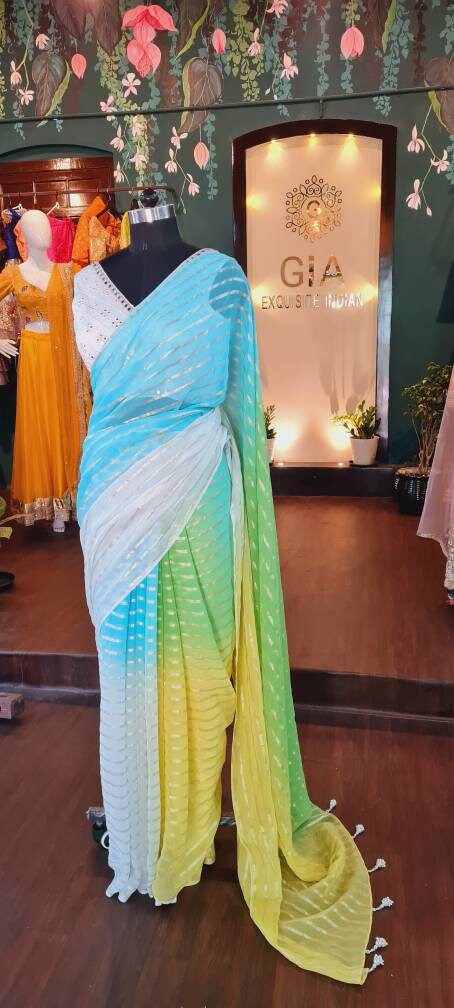 Multicolor Chiffon Saree with Gold Stripes & Aqua Blue Brocade Blouse