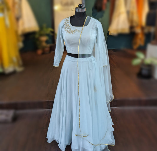 Powder blue Georgette and rawsilk lehenga by with net dupatta