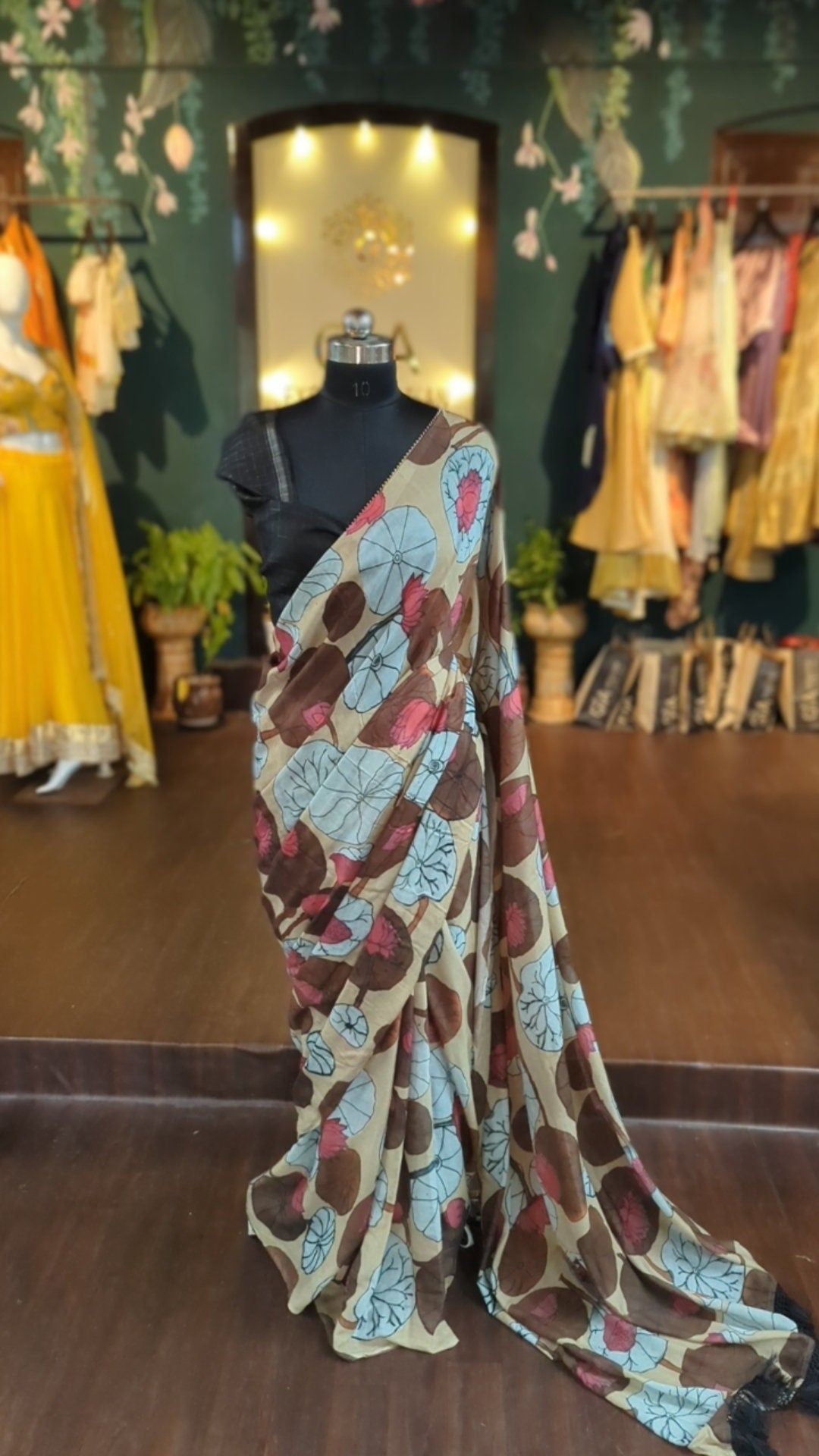 Soft muslin saree with watercolor Lotus print and jute blouse with zari lines