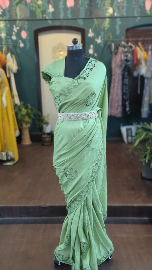 Pista green khadi silk saree with cutwork embroidery and matching blouse
