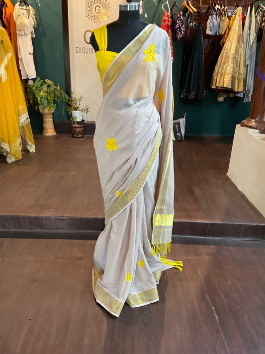 Beautiful beige Kerala saree with yellow floral applique work