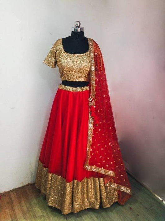 Red and gold sequin net lehenga