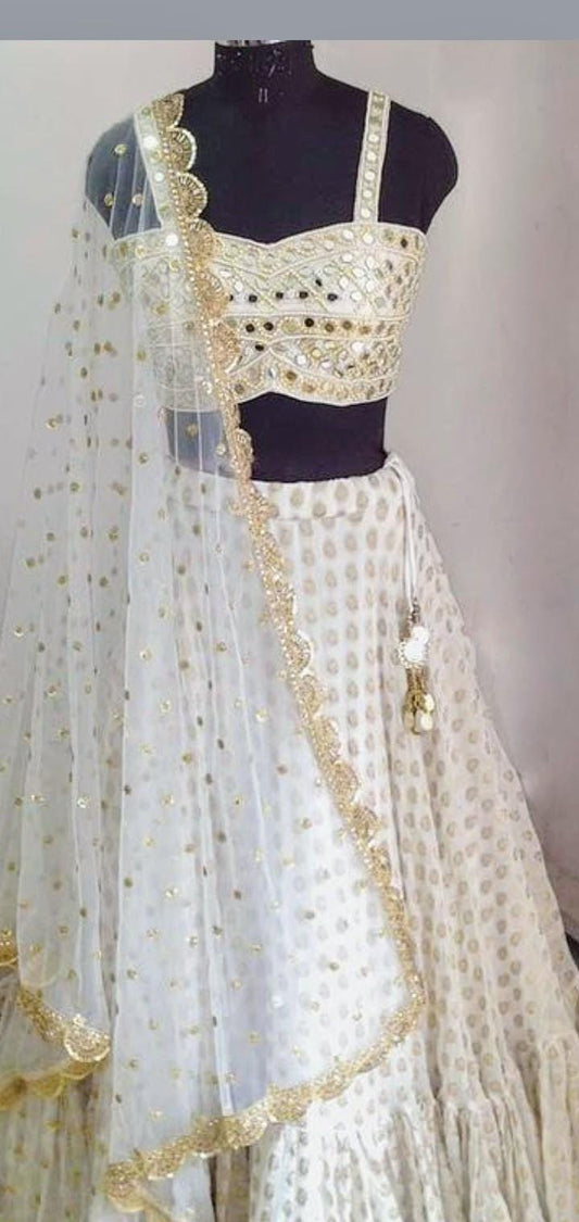 Ivory Hand embroidered mirror work  blouse with  brocade lehenga and tulle dupatta with sequins embroidery
