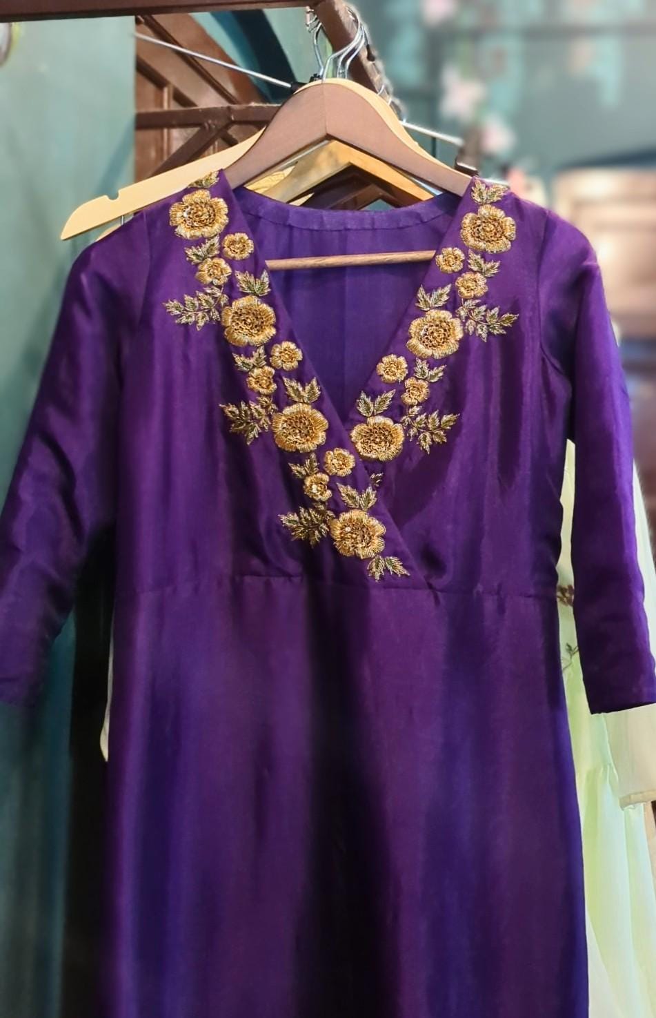 Purple silk cross over neck kurta with embroidery neckline