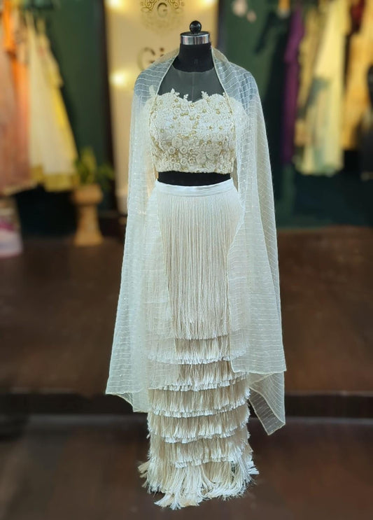 Stylish fringe lehenga with floral thread work and sequin blouse