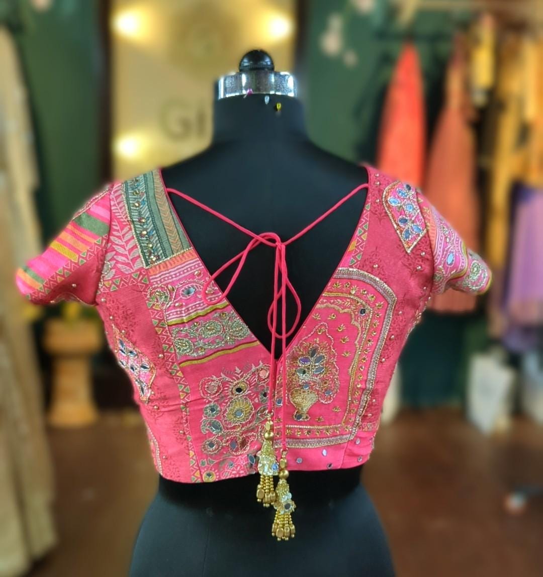 Beautiful multicolor pink based mirror embellished blouse with v neck