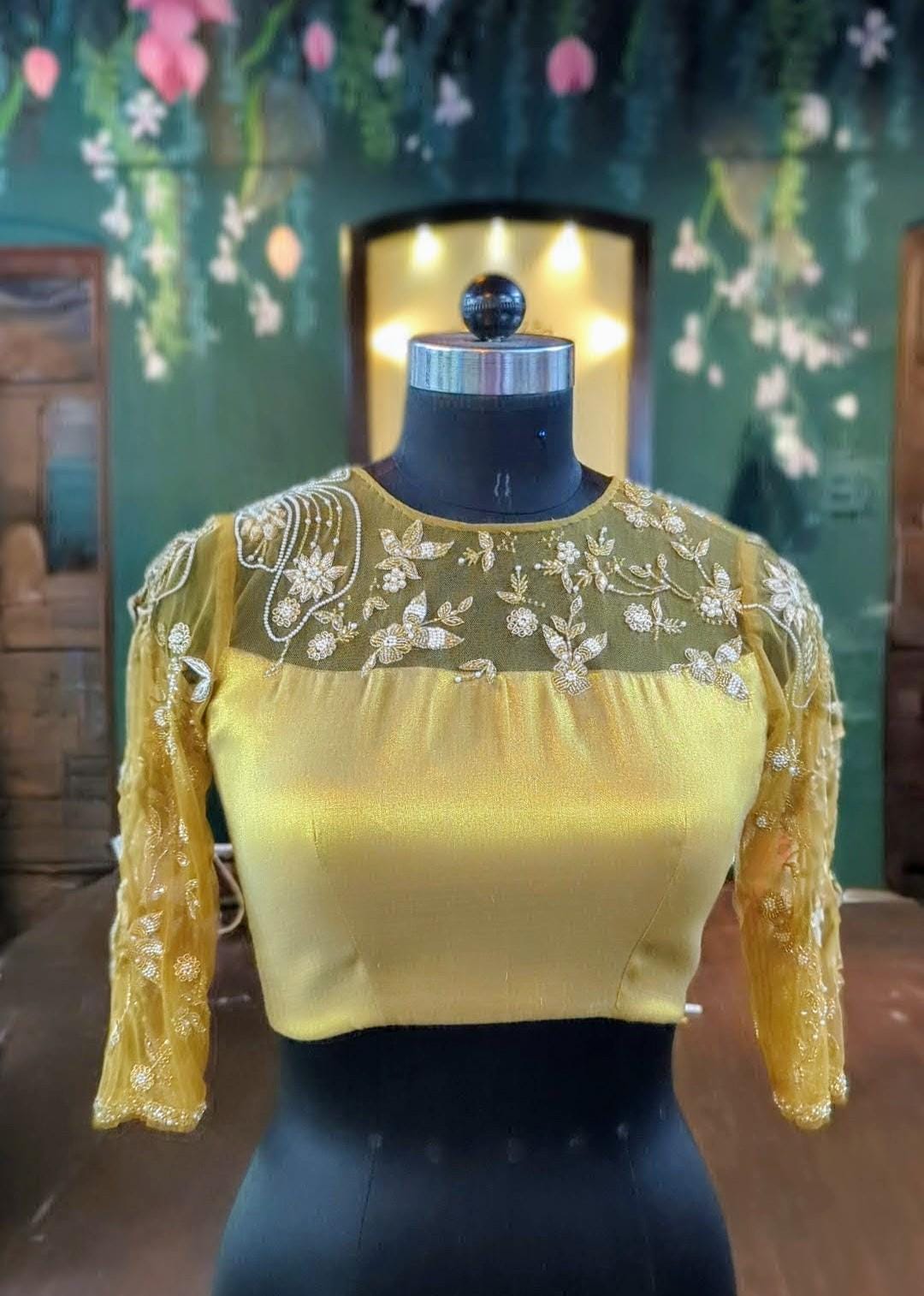 Gold tissue blouse with zardozi work