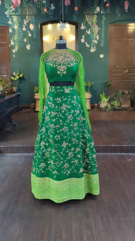Green lehenga with all over zardozi work with cape