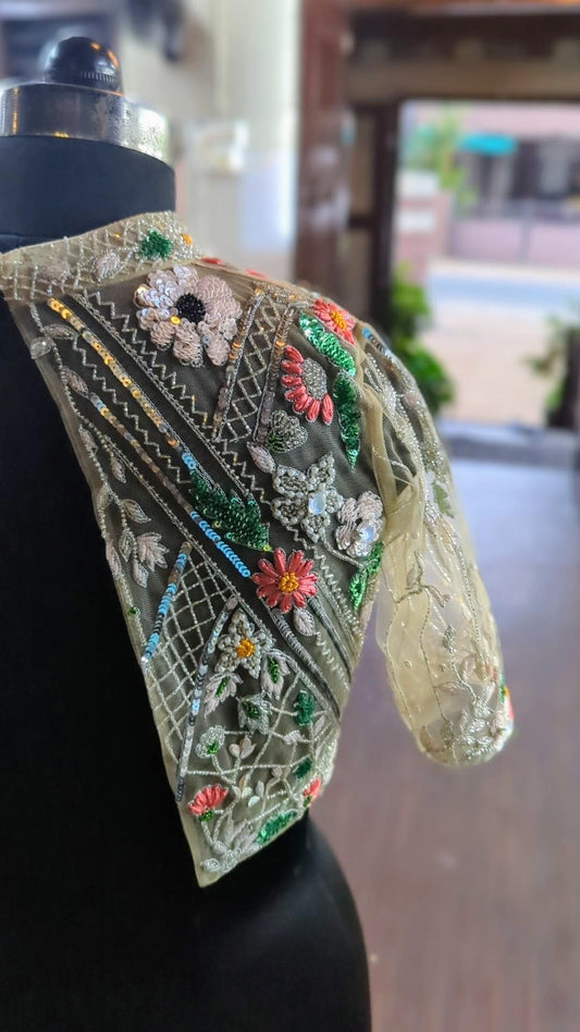 Stunning nude floral blouse with beautiful embroidery